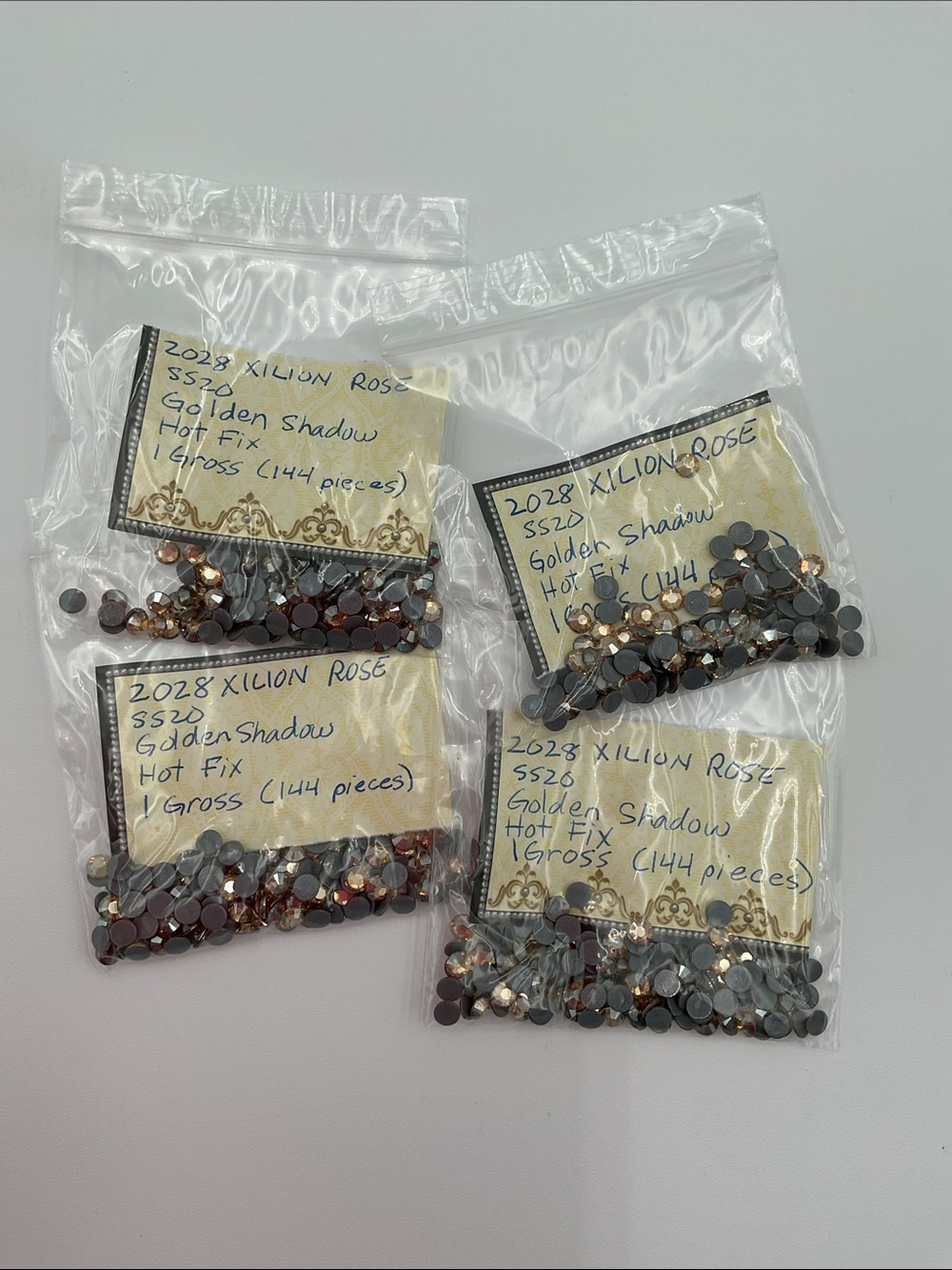 Swarovski • Color: Golden Shadow, 2028 XILION Rose Hotfix Rhinestones